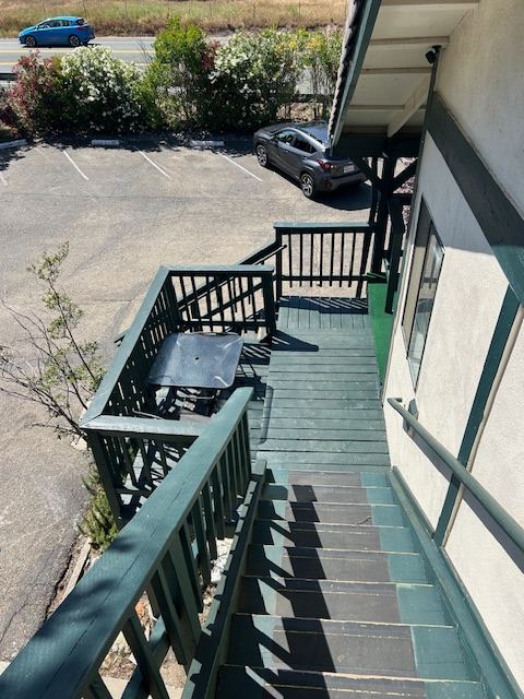 Exterior stairway and porch on the west side of the inn